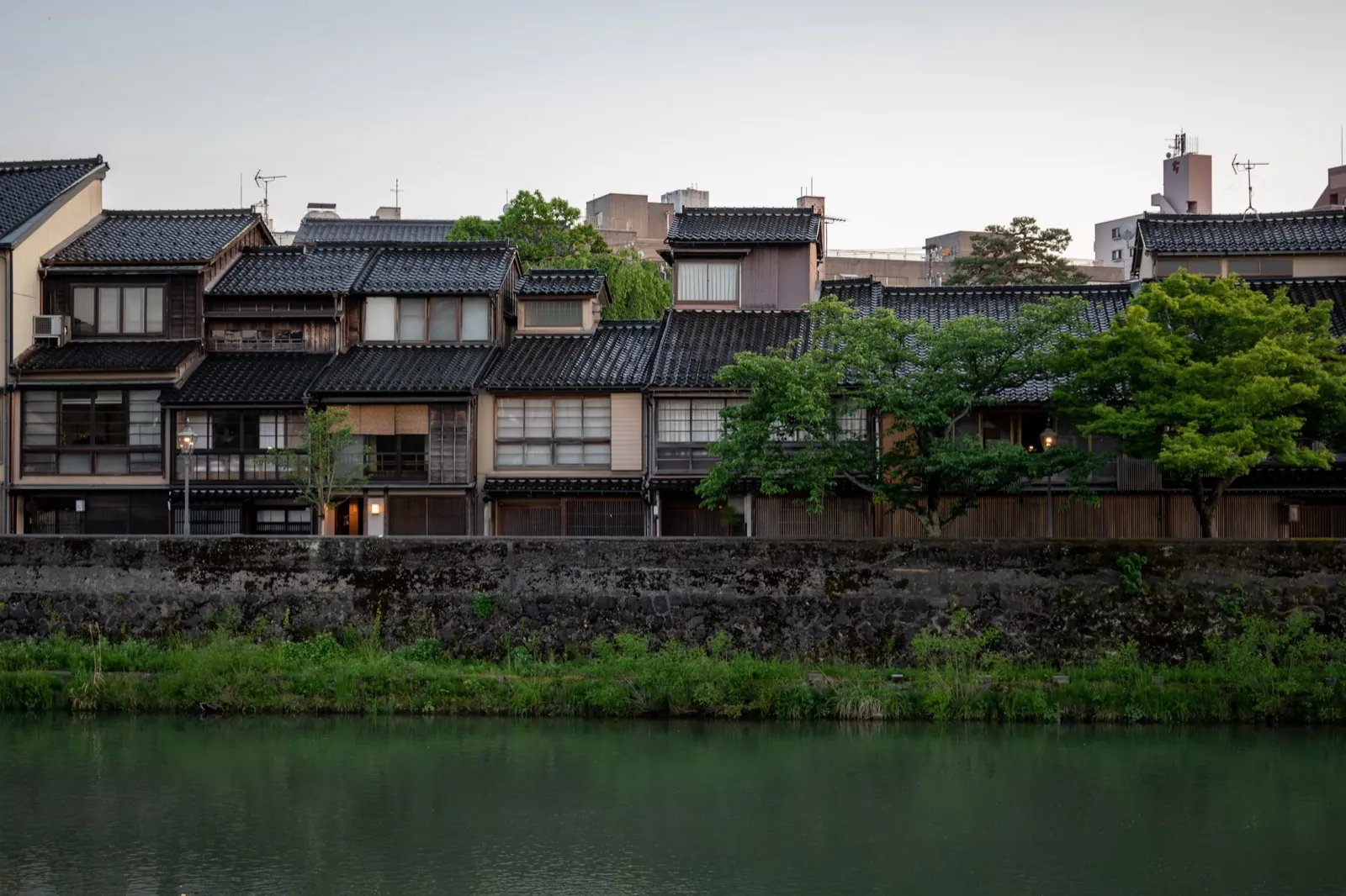 Traditional wooden houses by the river in the old quarter of Kanazawa