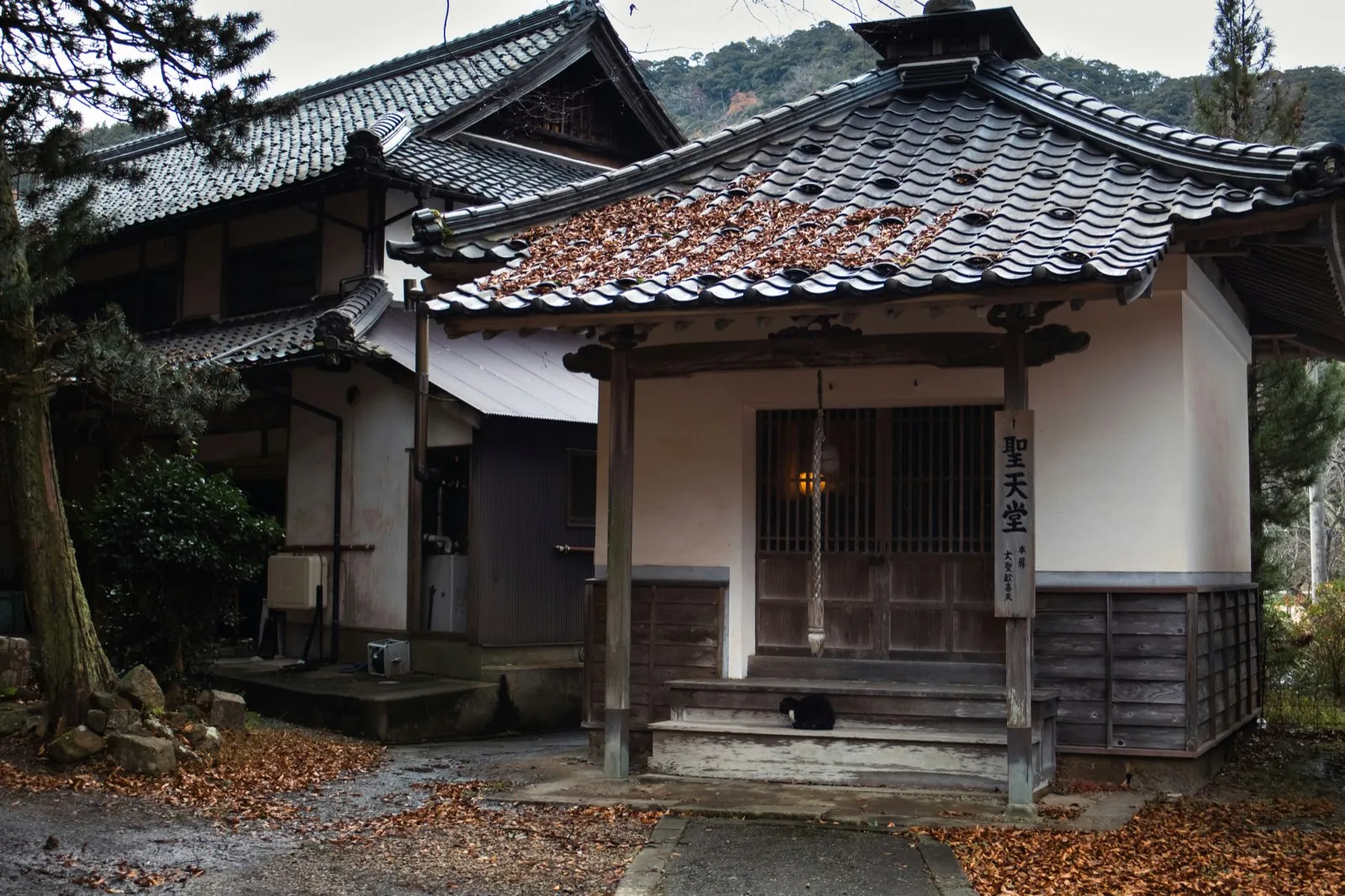 Traditional wooden pavilion with a tiled roof in Kinosaki Onsen